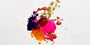Colorful abstract paint splash on white background, capturing creative expression.