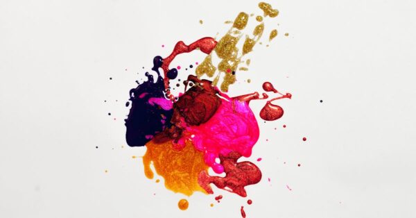 Colorful abstract paint splash on white background, capturing creative expression.
